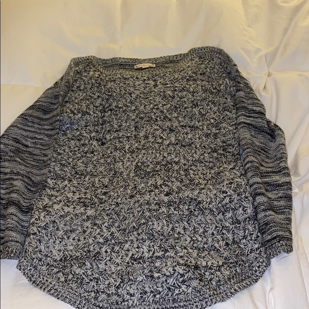 Gray, black and white sweater